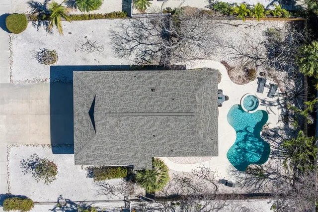 a vase of flowers sitting on a table