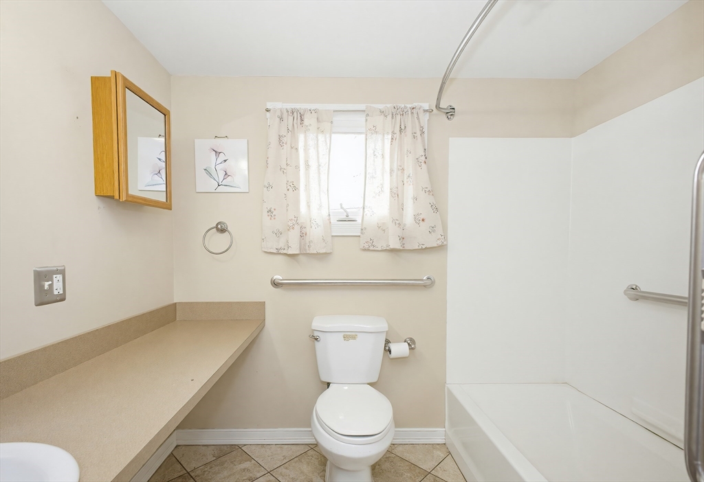 111 Almy Road Somerset, MA 02726 - Photo 22 of 42 a bathroom with a toilet sink and shower