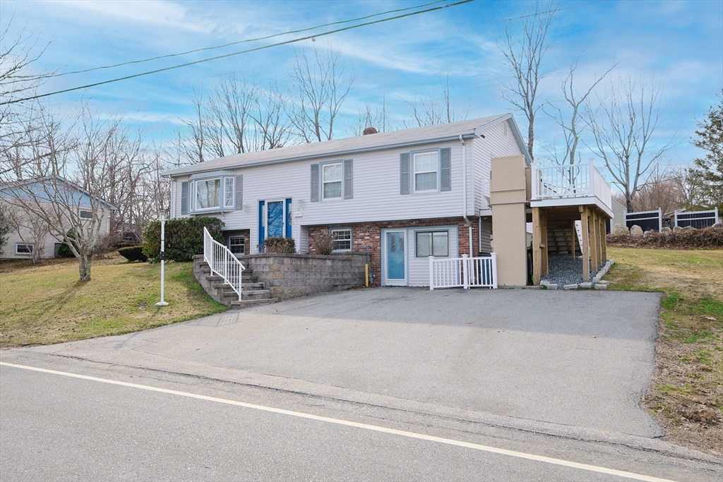 111 Almy Road Somerset, MA 02726 - Photo 3 of 42 a view of a house with a yard