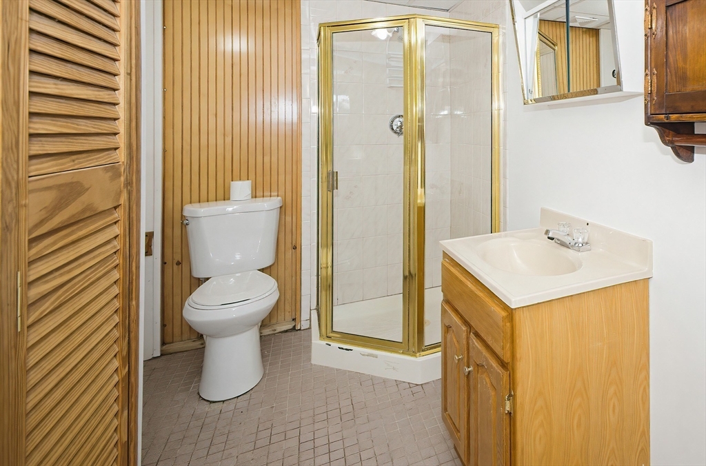 111 Almy Road Somerset, MA 02726 - Photo 35 of 42 a bathroom with a sink toilet and shower