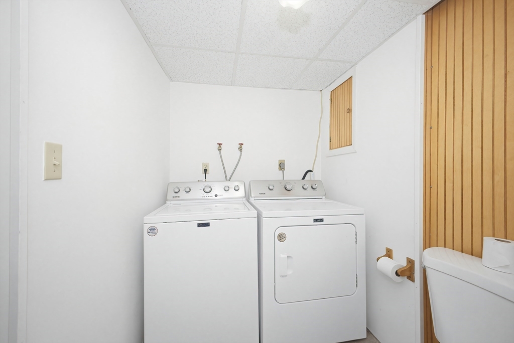 111 Almy Road Somerset, MA 02726 - Photo 36 of 42 a utility room with dryer and washer