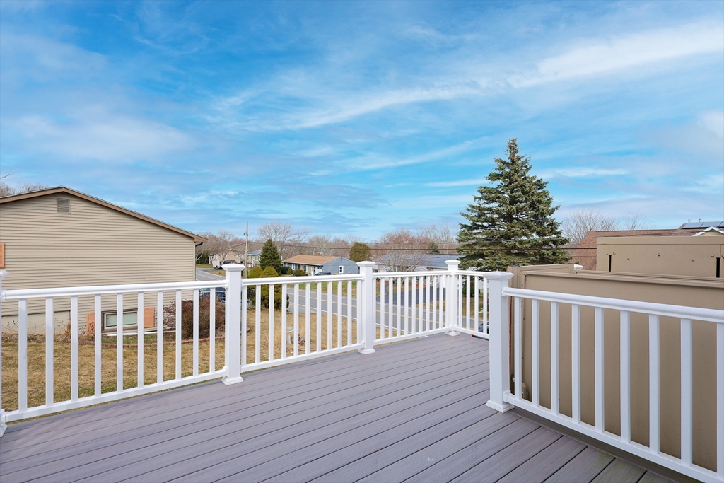 111 Almy Road Somerset, MA 02726 - Photo 37 of 42 a view of a wooden deck