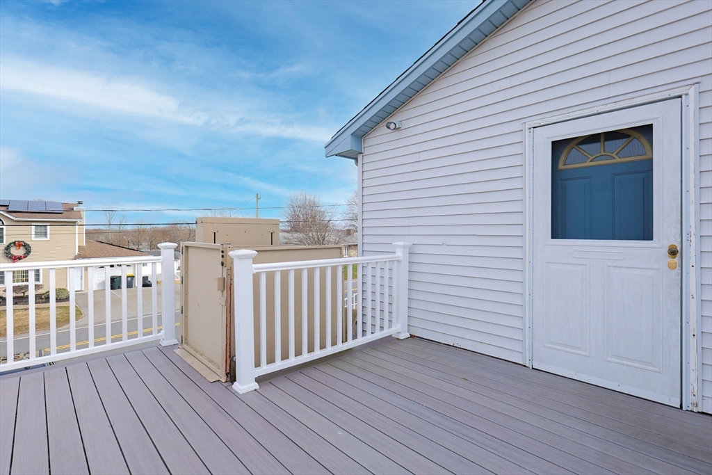 111 Almy Road Somerset, MA 02726 - Photo 38 of 42 a view of a balcony with wooden floor