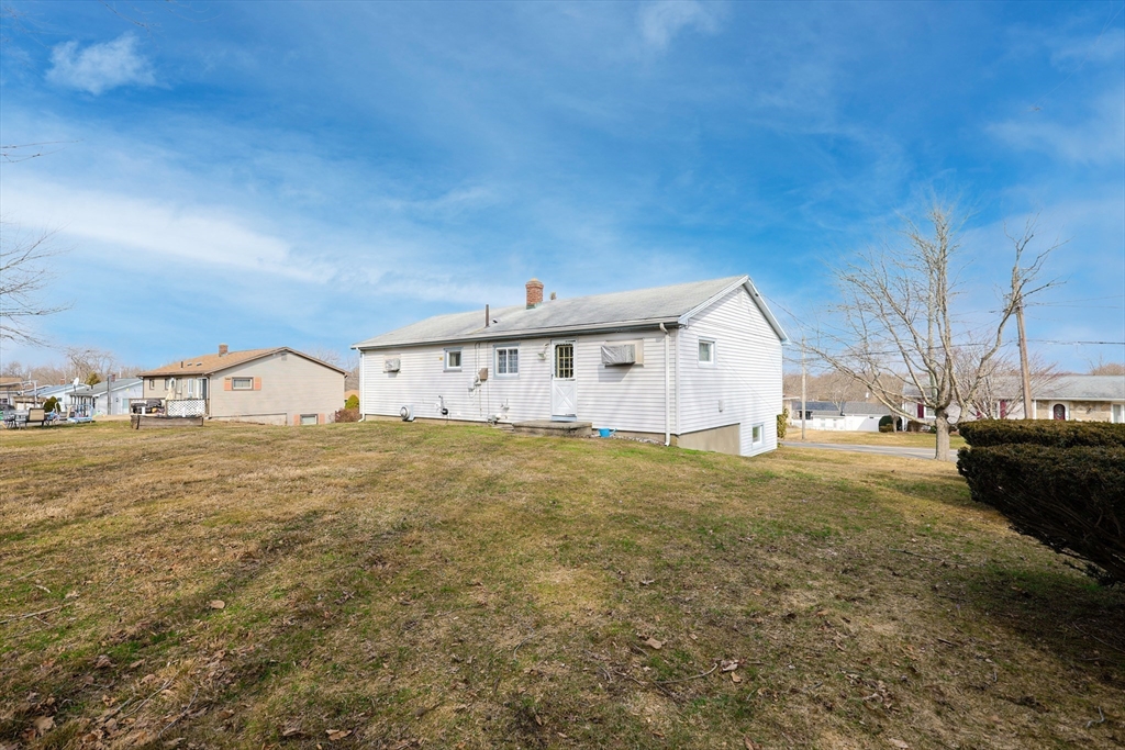 111 Almy Road Somerset, MA 02726 - Photo 41 of 42 a view of a house with a yard