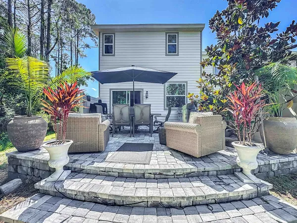 a view of a porch with furniture