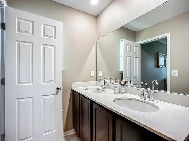 a room with a bed and a window