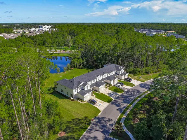 a view of a lake with a building in the back