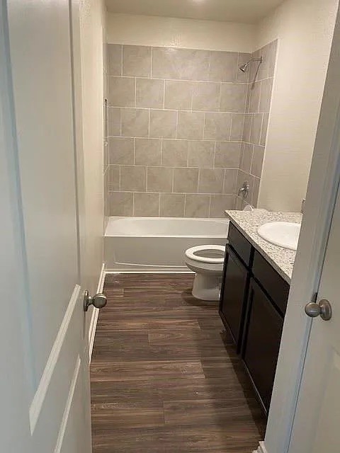 521 Locksley Cove Jarrell, TX 76537 - Photo 6 of 9 a bathroom with a sink a toilet and shower