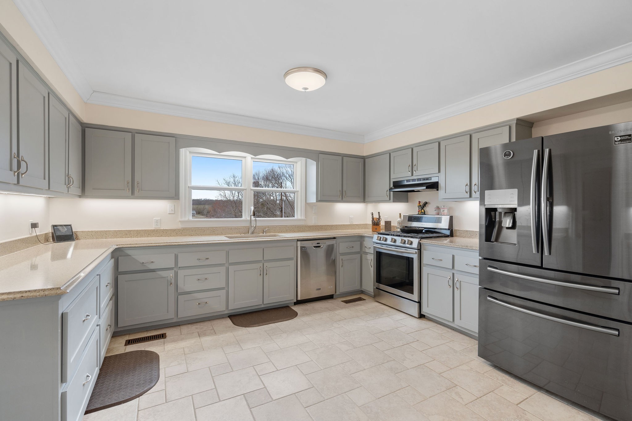 1280 Bold Springs Road McEwen, TN 37101 - Photo 13 of 66 a kitchen with granite countertop cabinets stainless steel appliances and a sink