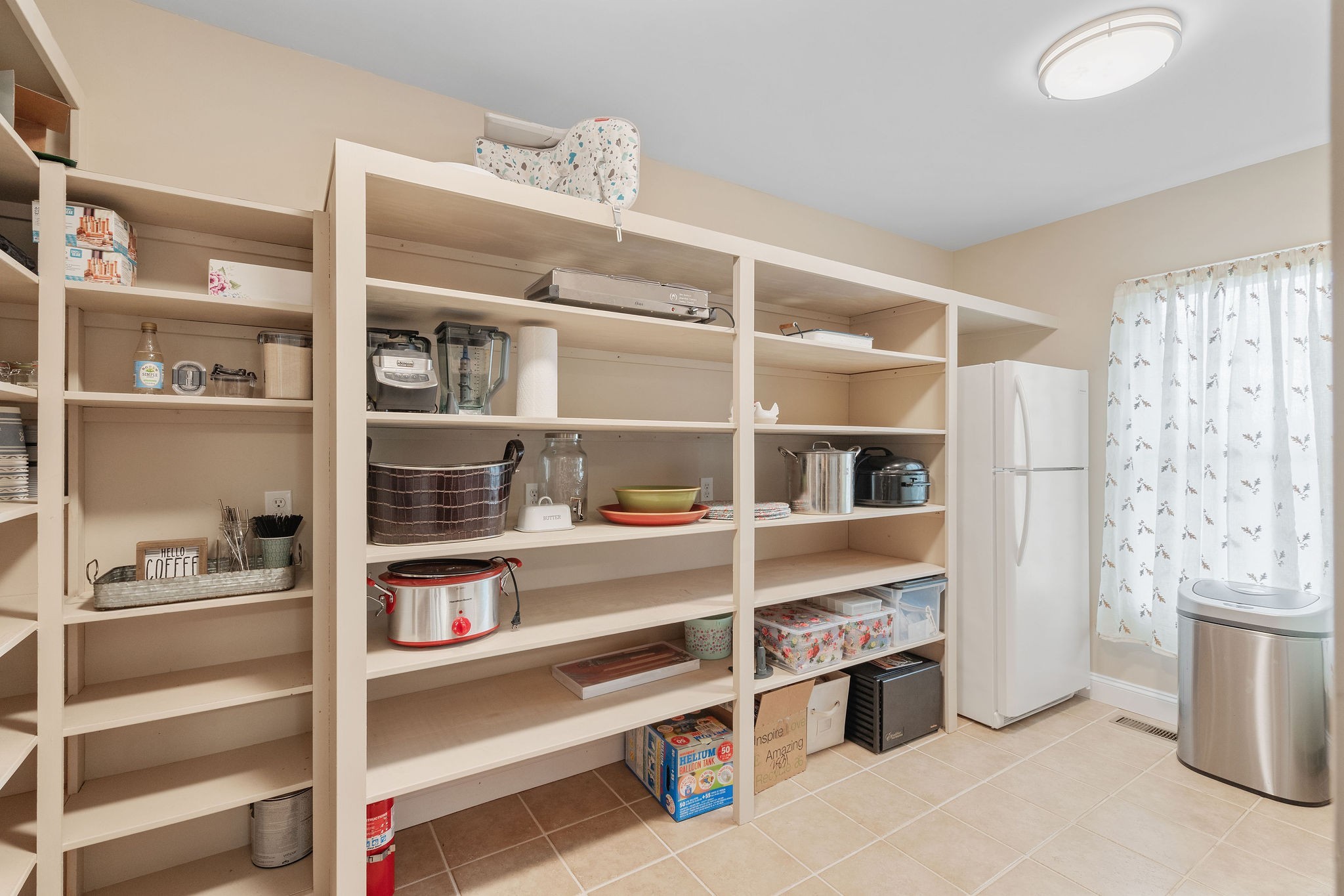 1280 Bold Springs Road McEwen, TN 37101 - Photo 16 of 66 a shelf with books and knick knacks on it