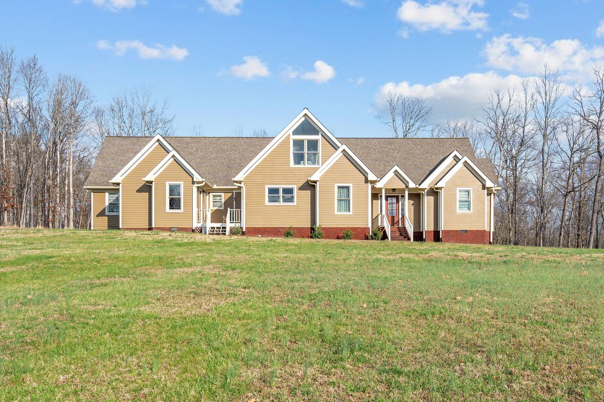 1280 Bold Springs Road McEwen, TN 37101 - Photo 2 of 66 a view of a house with yard and a garden