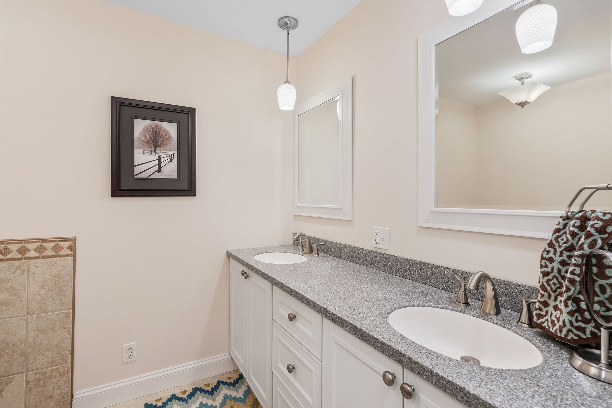 1280 Bold Springs Road McEwen, TN 37101 - Photo 22 of 66 a bathroom with a granite countertop sink and a mirror