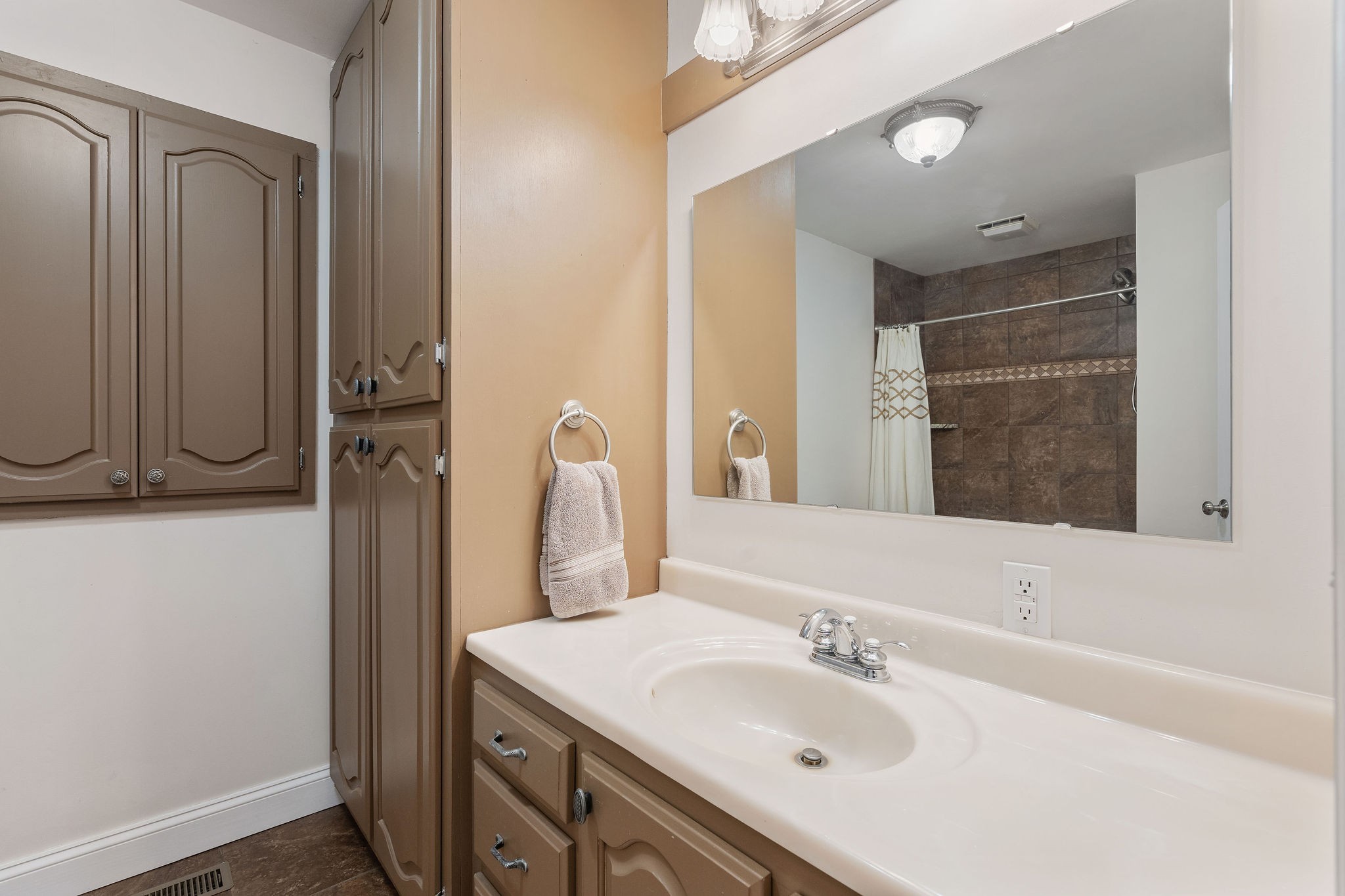 1280 Bold Springs Road McEwen, TN 37101 - Photo 25 of 66 a bathroom with a sink and a mirror