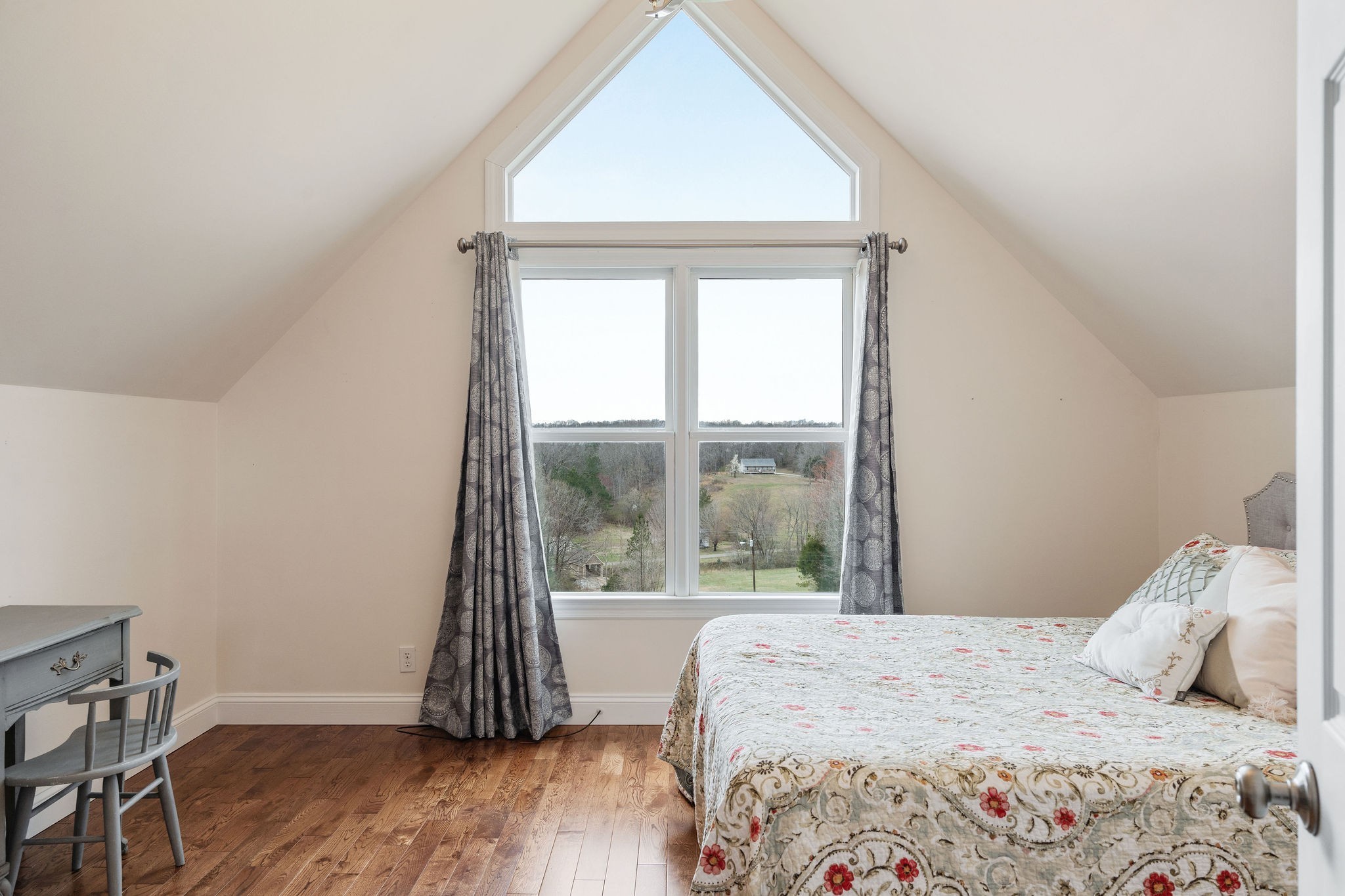 1280 Bold Springs Road McEwen, TN 37101 - Photo 27 of 66 a bedroom with a bed and a window