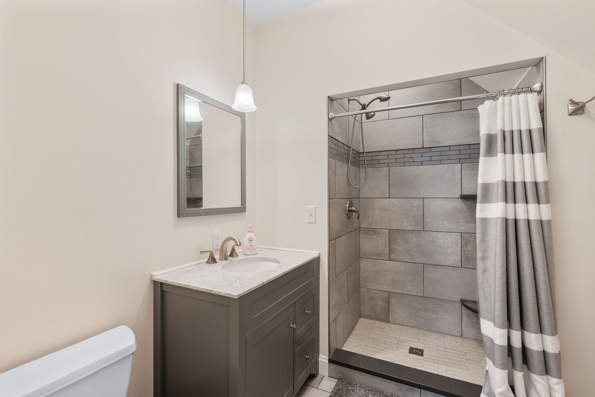 1280 Bold Springs Road McEwen, TN 37101 - Photo 32 of 66 a bathroom with a shower sink and mirror