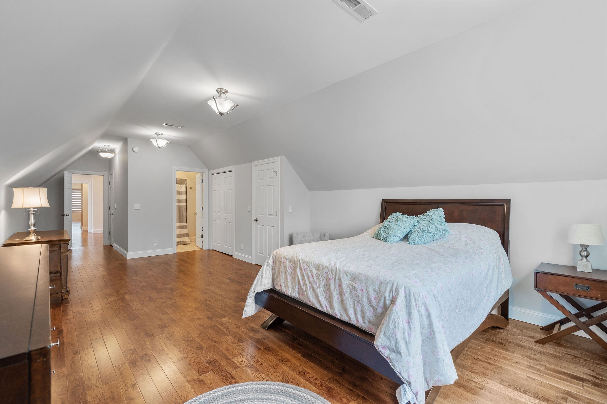 1280 Bold Springs Road McEwen, TN 37101 - Photo 38 of 66 a bedroom with a bed and cabinets