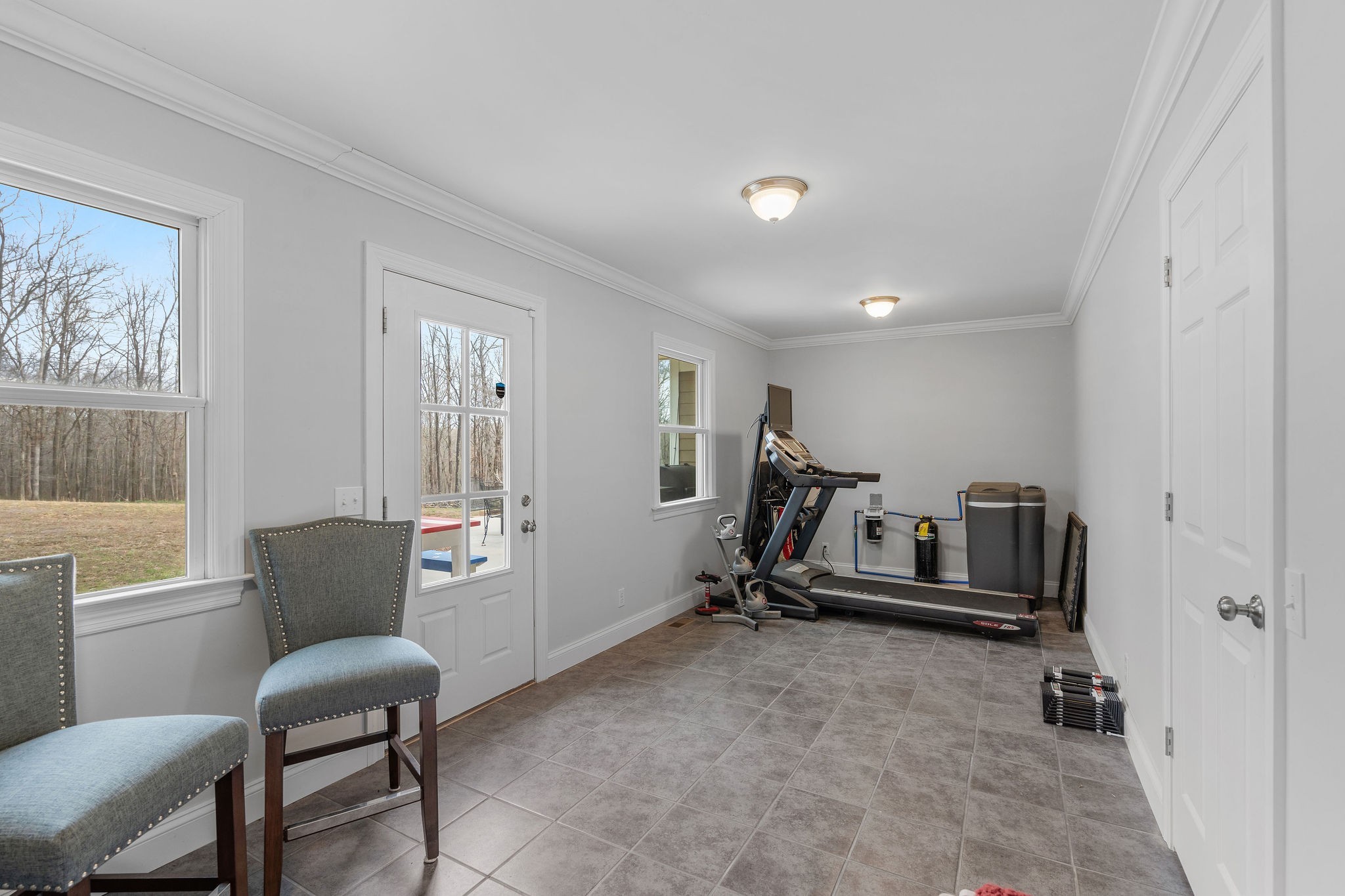 1280 Bold Springs Road McEwen, TN 37101 - Photo 40 of 66 a room with gym equipment and a window