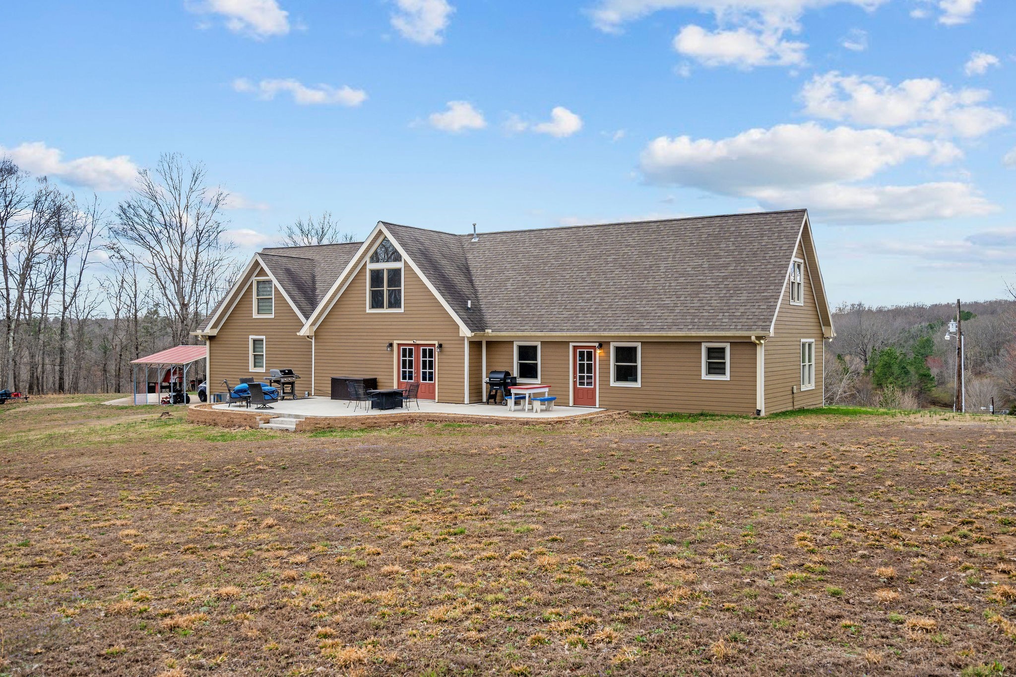 1280 Bold Springs Road McEwen, TN 37101 - Photo 43 of 66 a front view of house with yard and trees in the background