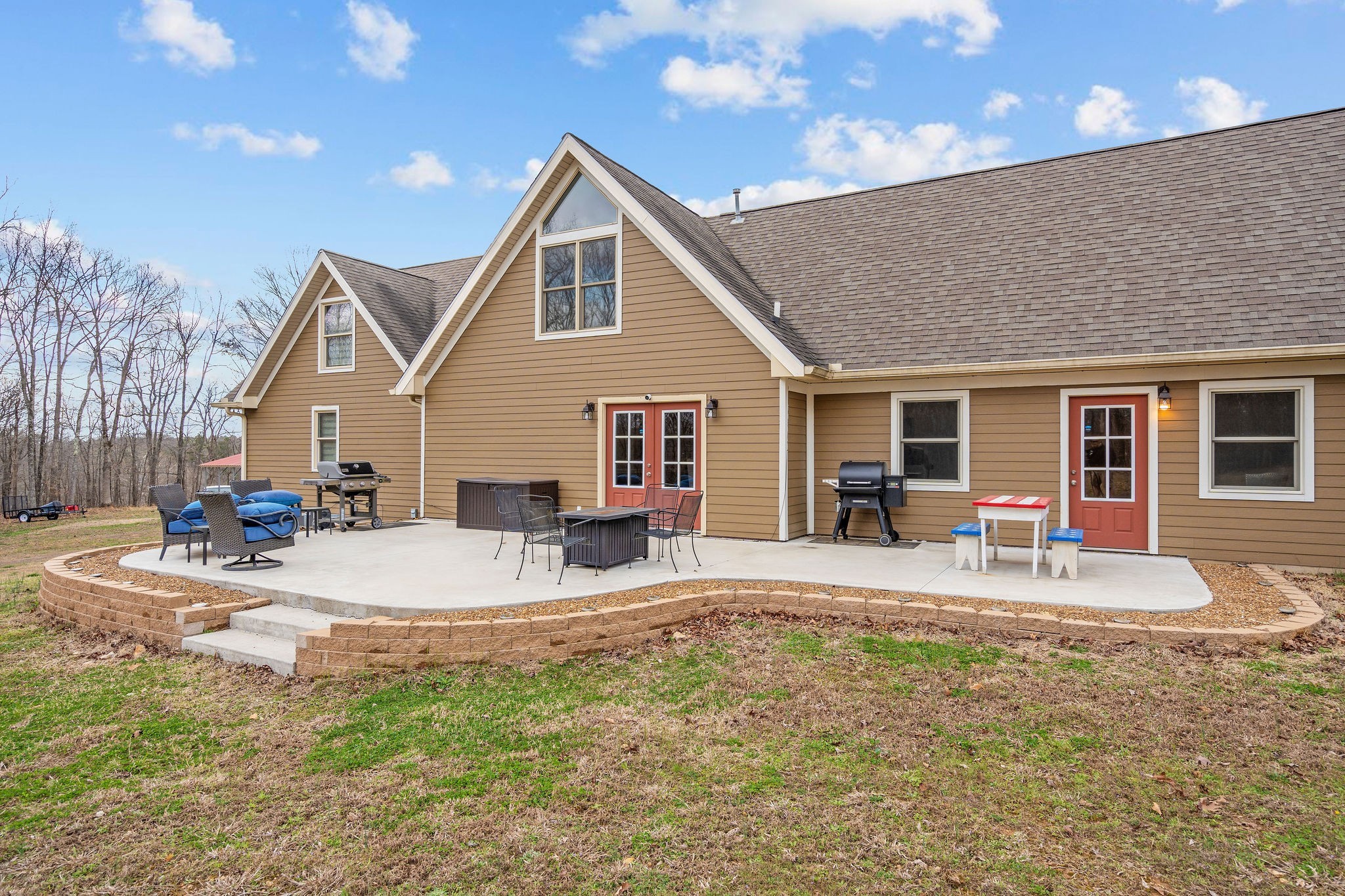 1280 Bold Springs Road McEwen, TN 37101 - Photo 44 of 66 a front view of a house with a patio and a yard