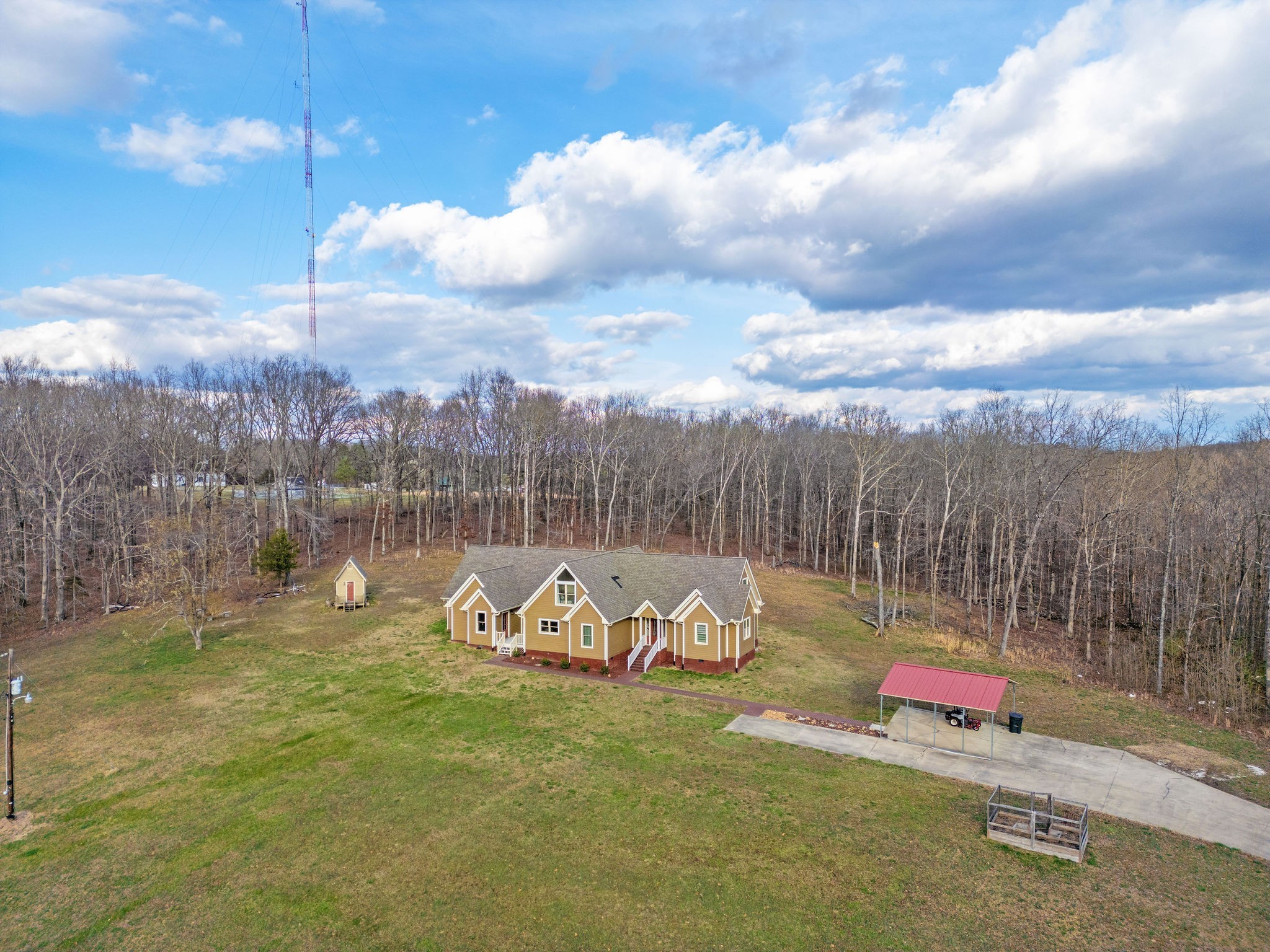 1280 Bold Springs Road McEwen, TN 37101 - Photo 51 of 66 a backyard of a house with table and chairs