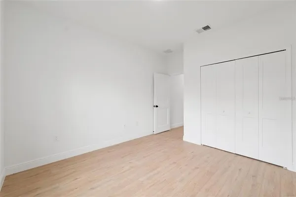 a view of a lake with a big yard