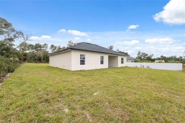 a view of a large window with an outdoor space