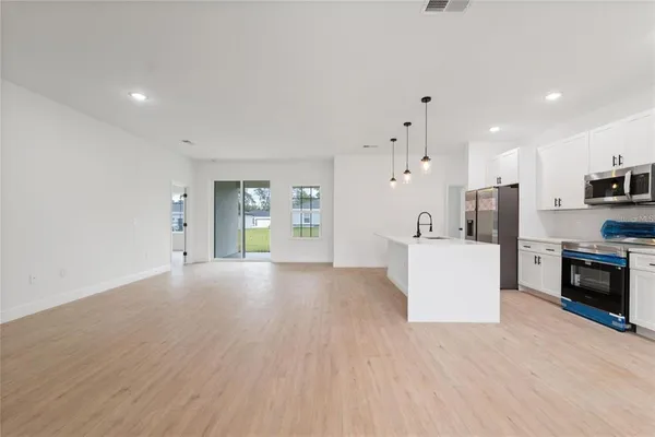 an empty room with windows