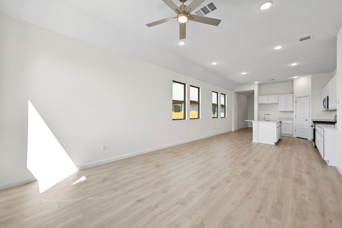 270 Bendecido Loop Elgin, TX 78621 - Photo 13 of 39 a view of an empty room with a window
