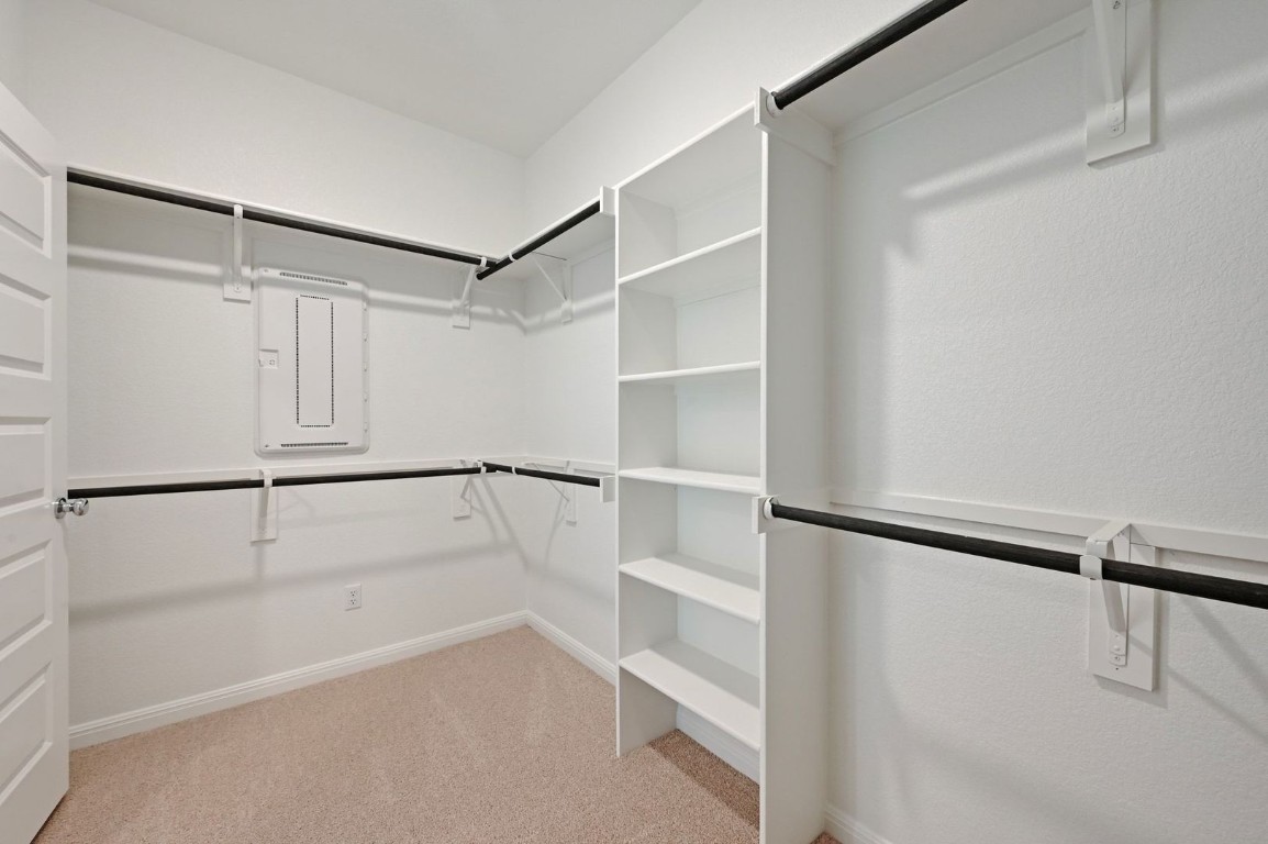 270 Bendecido Loop Elgin, TX 78621 - Photo 18 of 39 a view of an empty walk in closet