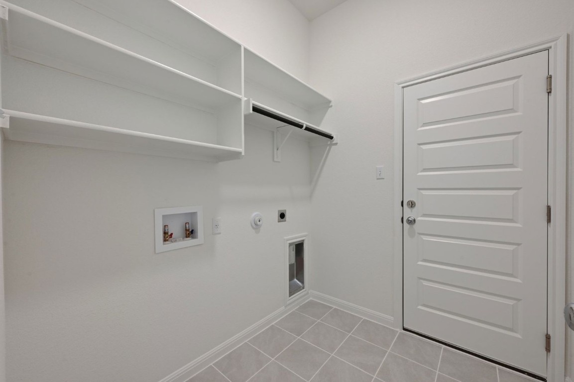 270 Bendecido Loop Elgin, TX 78621 - Photo 22 of 39 a view of an empty walk in closet