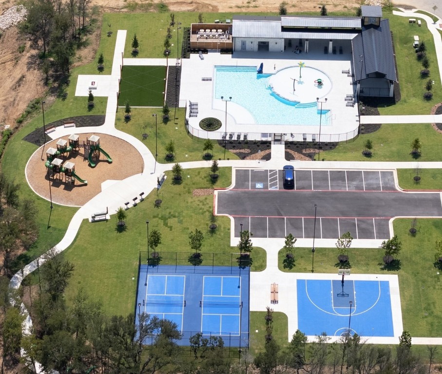 270 Bendecido Loop Elgin, TX 78621 - Photo 28 of 39 an aerial view of a house with a swimming pool a yard and outdoor seating
