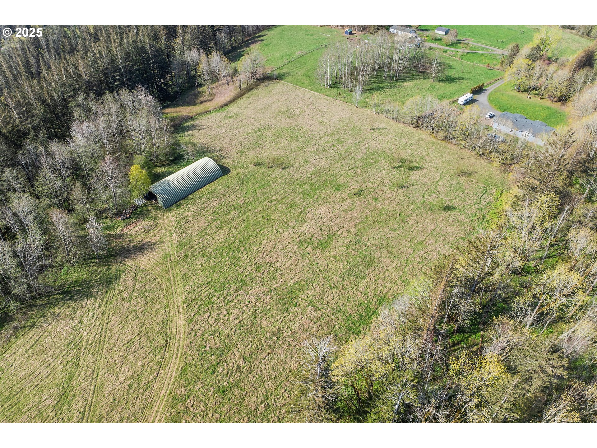 39149 East Knieriem Road Corbett, OR 97019 - Photo 1 of 16 a view of a yard with an outdoor