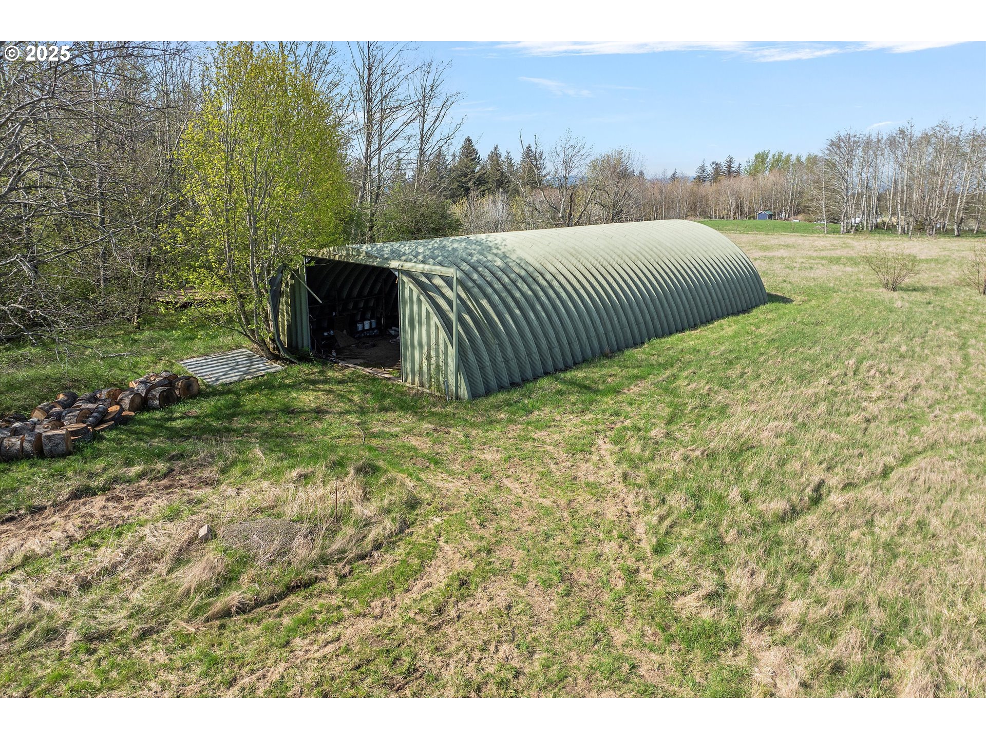 39149 East Knieriem Road Corbett, OR 97019 - Photo 11 of 16 a view of a garden with an outdoor space