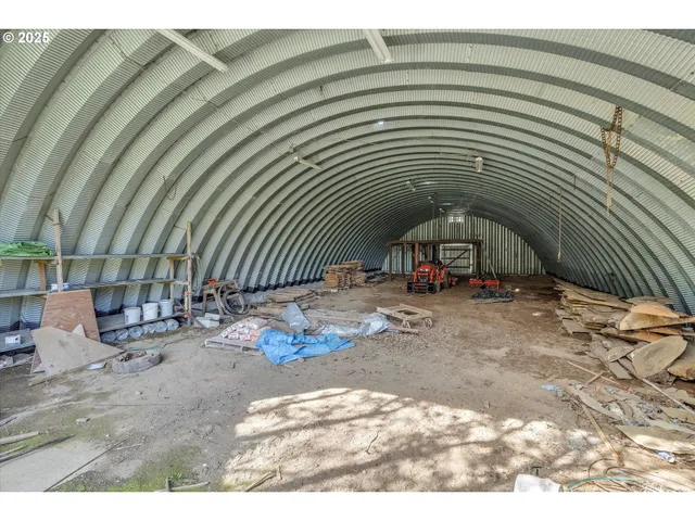 a view of swimming pool with sitting area