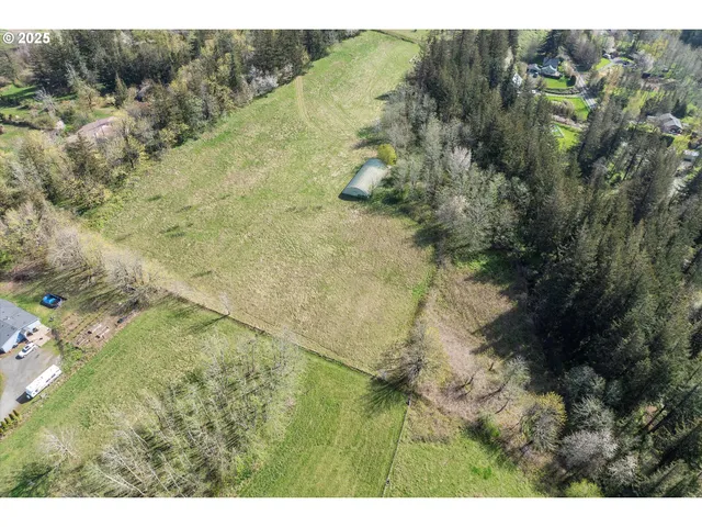 a view of a yard with an outdoor space