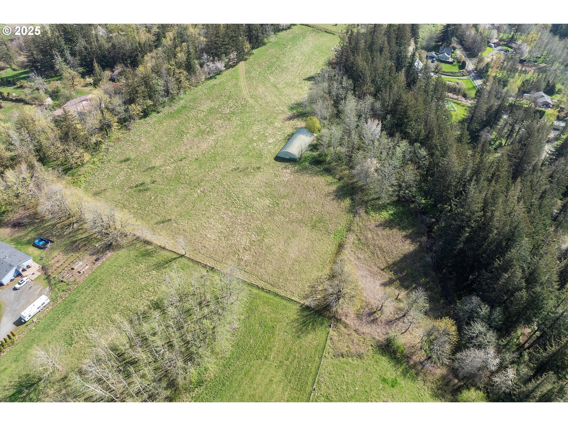 39149 East Knieriem Road Corbett, OR 97019 - Photo 6 of 16 a view of a yard with an outdoor space