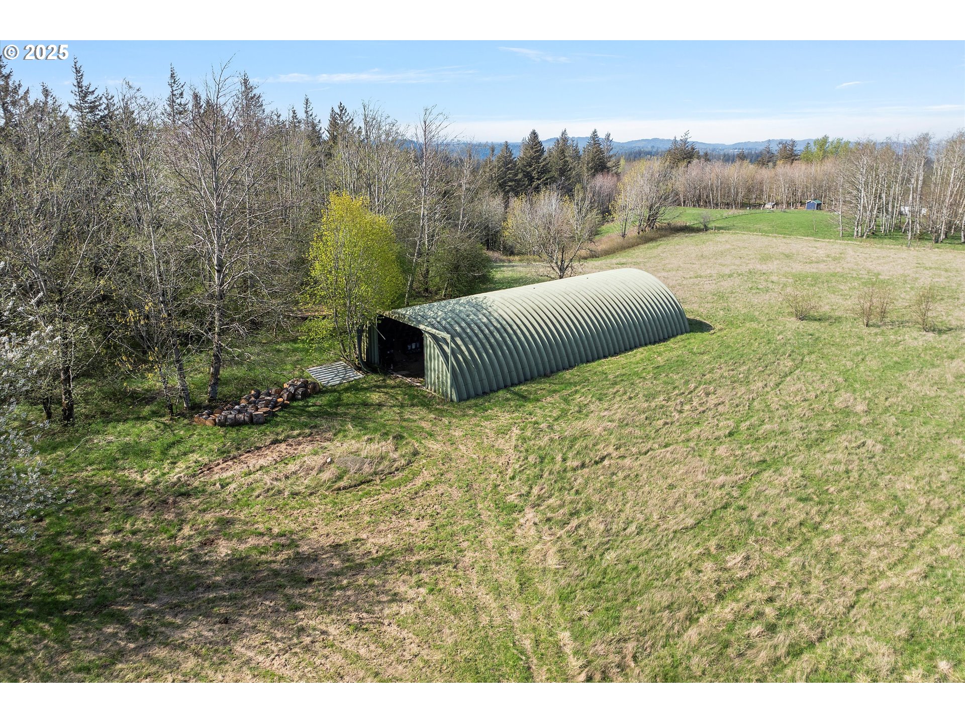 39149 East Knieriem Road Corbett, OR 97019 - Photo 10 of 16 a view of a backyard with trees