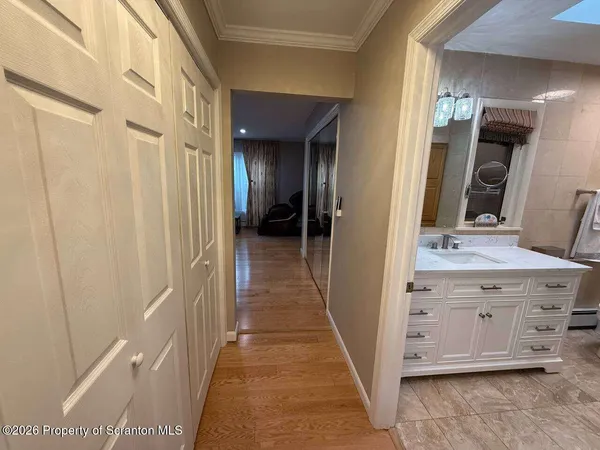 a bathroom with a bathtub and a sink