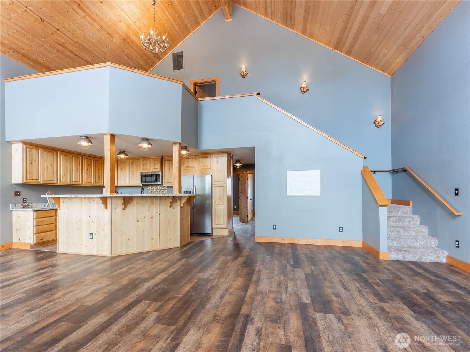 117 Hummingbird Road East Wenatchee, WA 98802 - Photo 8 of 40 a view of a kitchen with a wooden floor