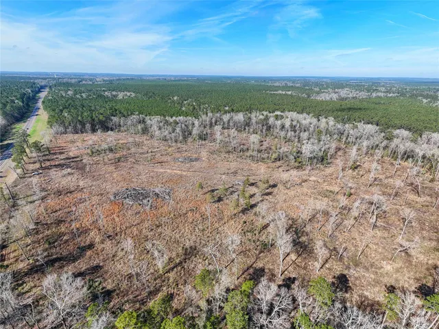 a view of a yard with an outdoor space