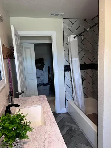 a view of front door and bedroom