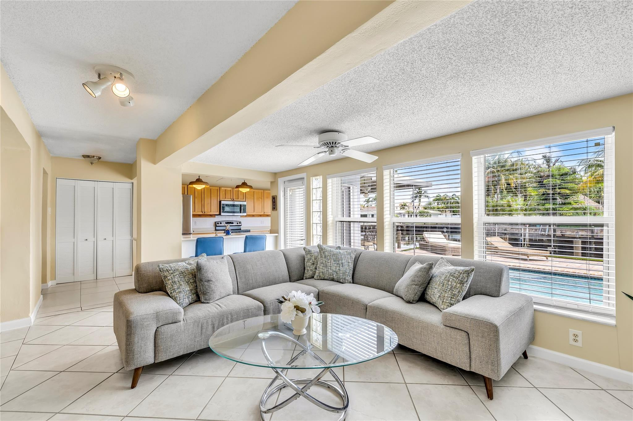 4730 Northeast 22nd Avenue Lighthouse Point, FL 33064 - Photo 20 of 35 a living room with furniture and a large window