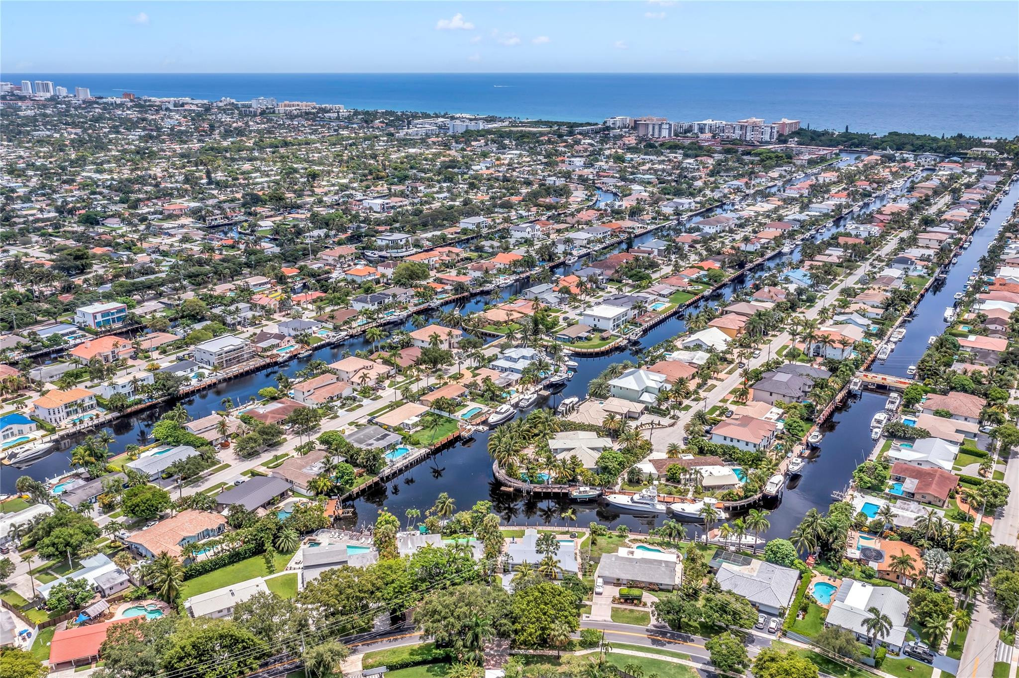 4730 Northeast 22nd Avenue Lighthouse Point, FL 33064 - Photo 2 of 35 an aerial view of residential houses with city view