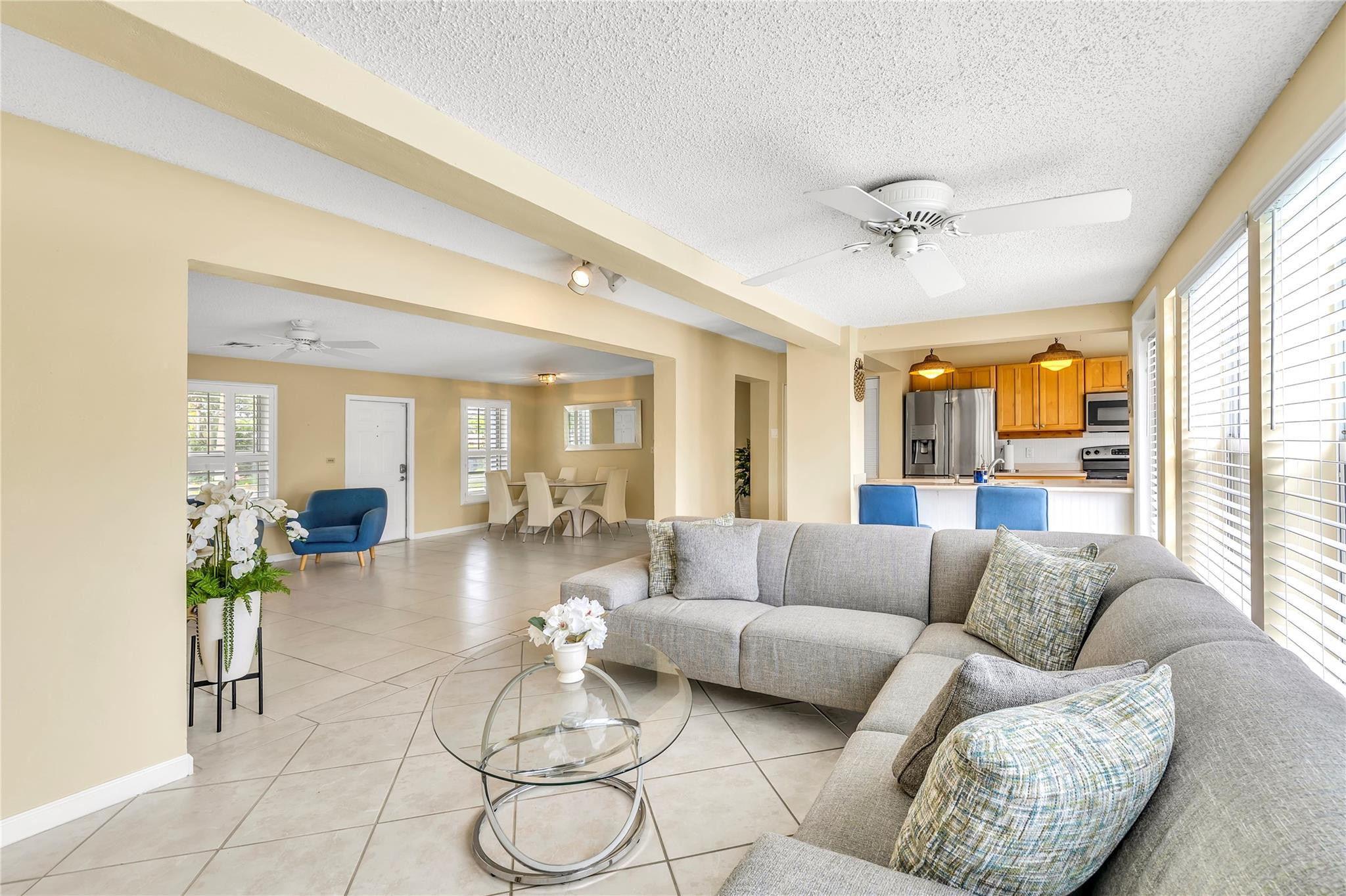 4730 Northeast 22nd Avenue Lighthouse Point, FL 33064 - Photo 21 of 35 a living room with furniture and a large window