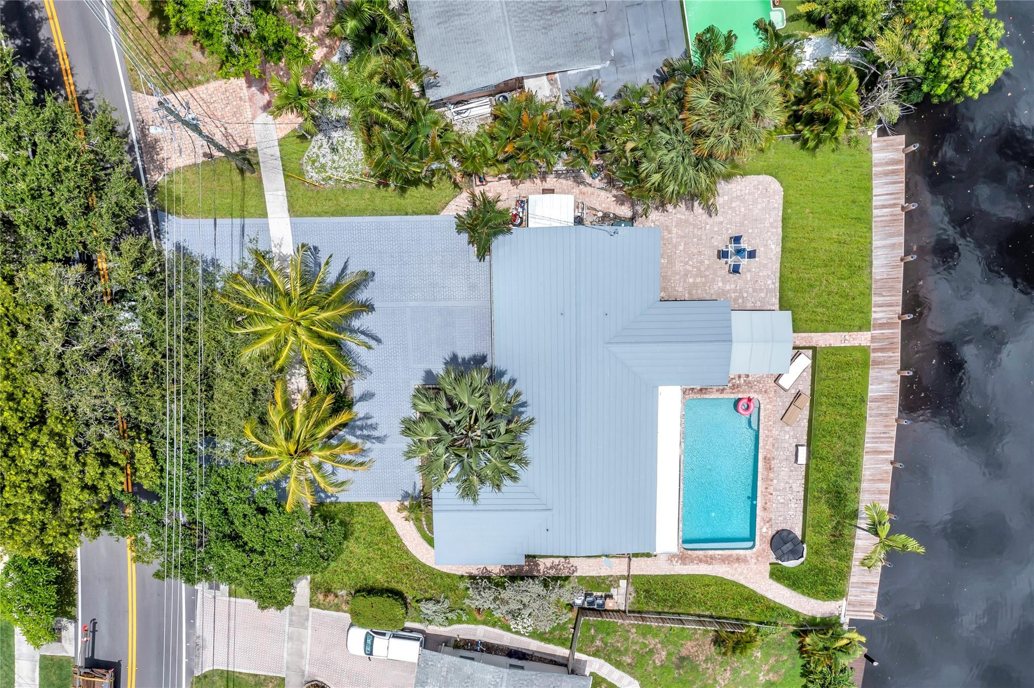 4730 Northeast 22nd Avenue Lighthouse Point, FL 33064 - Photo 3 of 35 an aerial view of a house with a yard basket ball court and outdoor seating