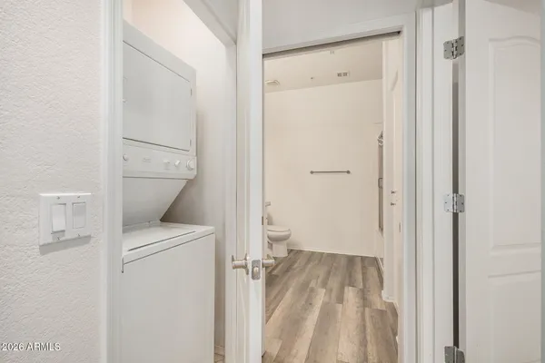 a view of bathroom with a washer and dryer