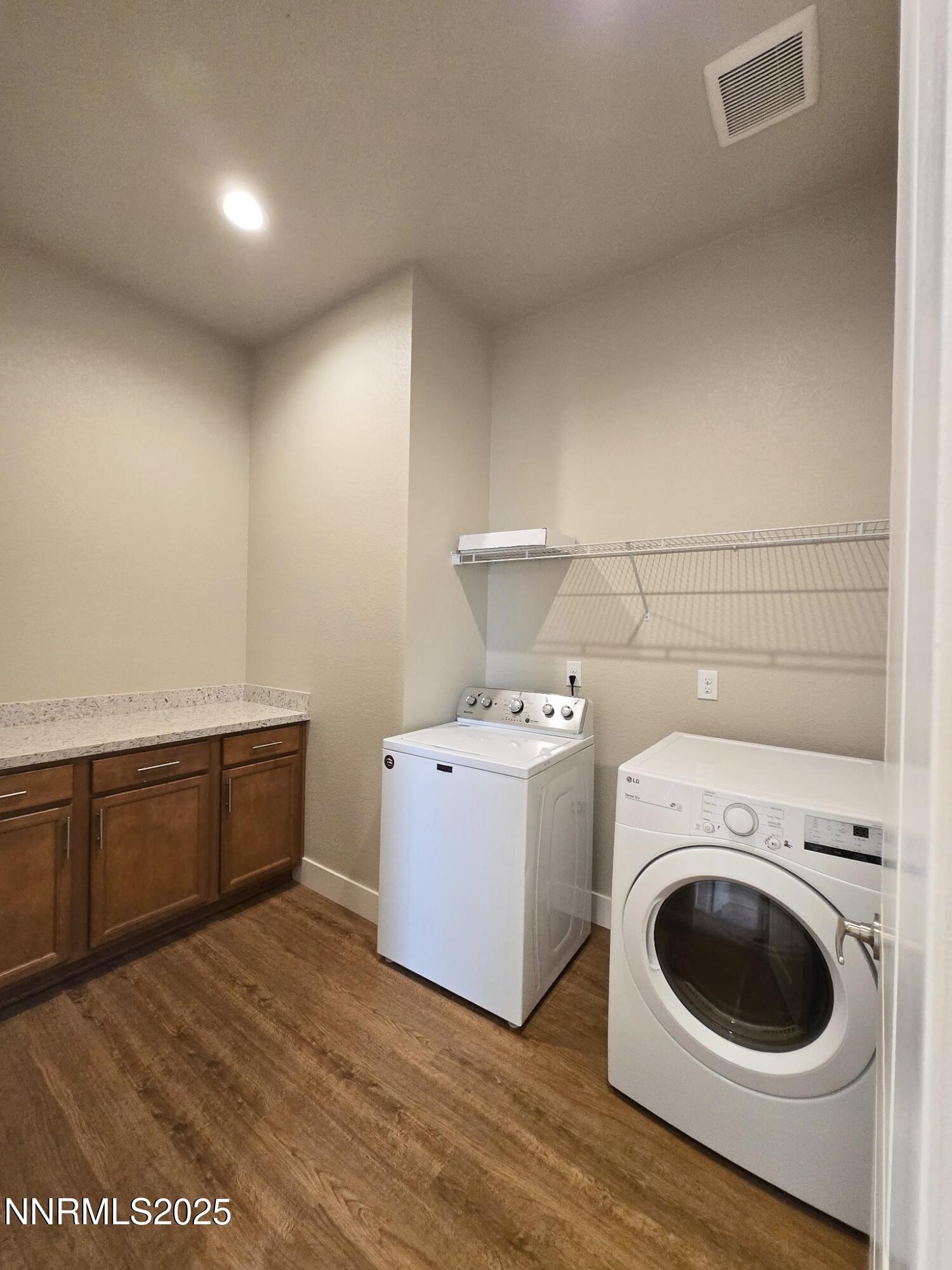 162 Jennys Lane Fernley, NV 89408 - Photo 13 of 39 a view of a storage & utility room with washer and dryer
