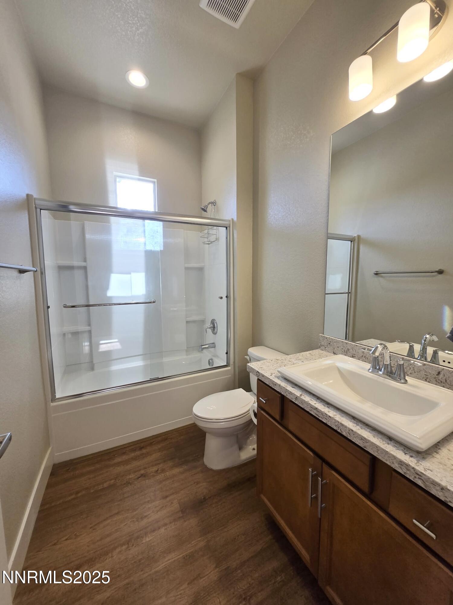 162 Jennys Lane Fernley, NV 89408 - Photo 20 of 39 a bathroom with a sink a toilet and shower