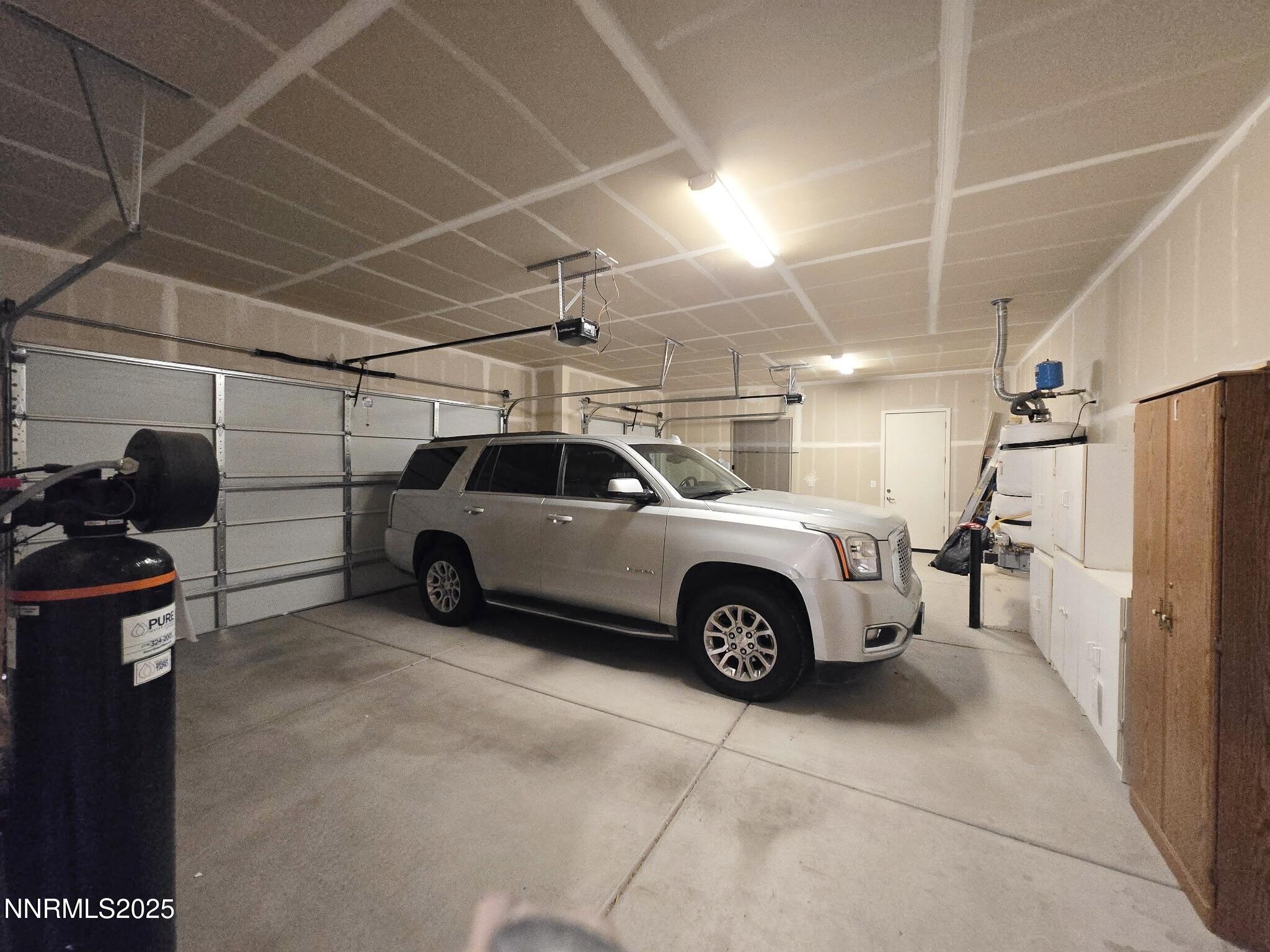162 Jennys Lane Fernley, NV 89408 - Photo 21 of 39 a view of a car garage