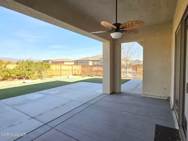 a view of a backyard of the house